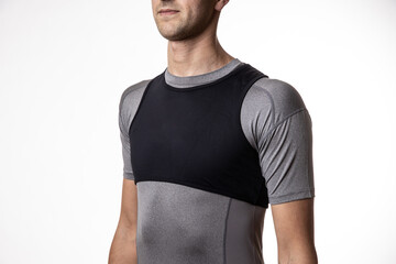 Closeup of man wearing black and gray sportswear