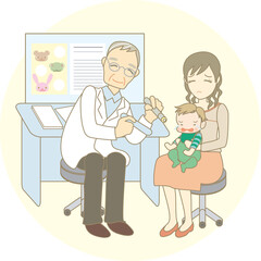 病院で優しそうな医師の診察を受ける人