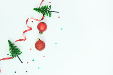 
New Year's background with Christmas balls, confetti and New Year's decorations on a white...