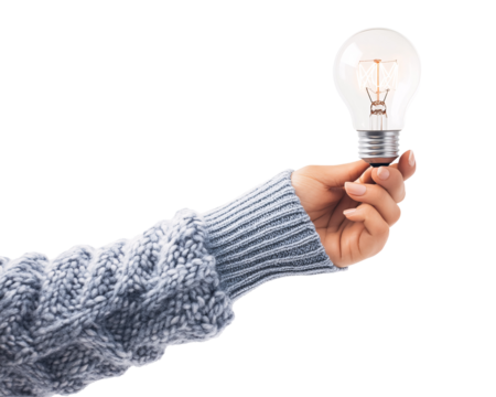 a hand holding a light bulb