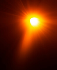 Obraz premium add lens flare effects for overlay designs or screen blending. Abstract sunburst flare iridescent glare over black background. sunrays light. Big Bang theory. golden yellow light sun rays.burst bokeh