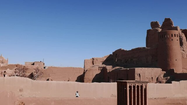 Ancient Iranian clay fort and village, with clay architecture in the desert. The use of Iranian Badger wind catchers to cool rooms. Ancient air conditioners or wind catchers a smart wind towers.