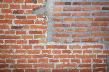 Fototapeta premium Close-Up Photography of Rough Red Brick Wall Texture with Porosity