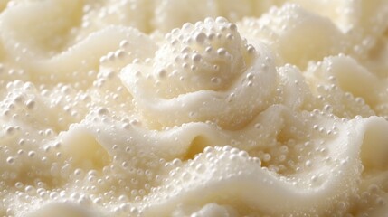 Close-up of creamy, bubbly mashed potatoes.