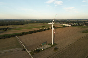Wind turbine on agricultural landscape