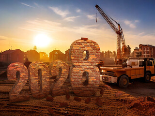 Brick New Year 2028 on construction site with dump truck and crane in the background sunset and town. Idea for a post for a construction company. 3d rendering