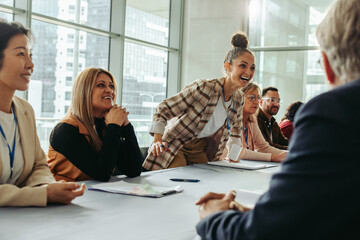 Business professionals engaged in vibrant discussion during a meeting