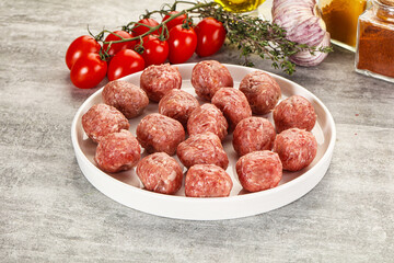 Uncooked raw beef meatball minced