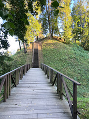 Fototapeta premium Wooden bridge leading to the Vytautas Hill, Birstonas, Lithuania