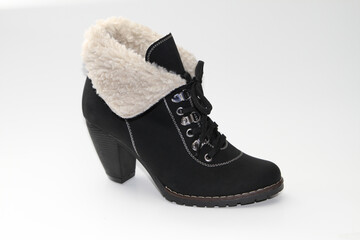 Women's boots. Short-throated. On a white background. Side view.
