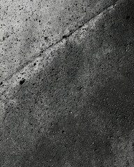 Matte light grey and black concrete texture with soft tonal variations for design applications