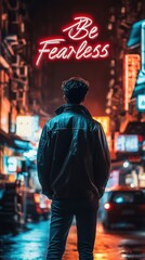 Obraz premium A person stands alone on a bustling urban street at night, surrounded by vibrant neon signs. The atmosphere feels electric, encouraging a sense of bravery and adventure.