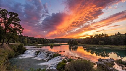 Obraz premium The vibrant colors of the sunset over Cascade Springs, cascade springs, sunset, beautiful view, natural wonder, scenic landscape