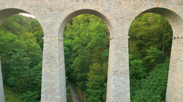 Experience the breathtaking Zampach railway bridge, the tallest stone bridge in Czechia. Surrounded by lush greenery, this architectural marvel offers incredible views of the landscape.