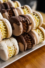 Colored macarons on a stand.Macarons.Macarons close-up.Vertical photo