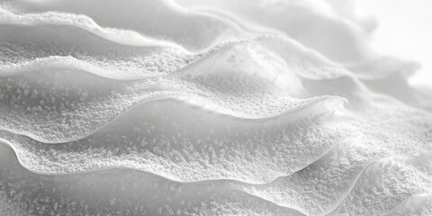 Layered frost-covered snow formations in a close-up view, highlighting the intricate beauty of winter&rsquo;s details