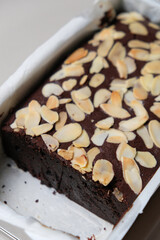 Chocolate pumpkin brownies topped with almonds.