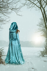 Robed Woman In Snow