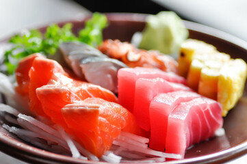 sashimi or raw salmon , Akami and raw tuna or raw mackerel and kanikama and wasabi or raw fish