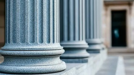 Majestic marble columns of a classical building symbolize law, order, and historical architecture
