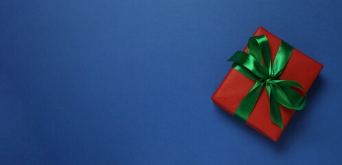 Beautiful gift box on color background © Sunlight