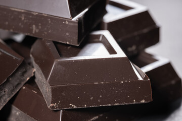 broken chocolate bar chips, parts or pieces pile