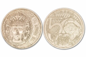 Closeup of Romania's fourth Leu, bani coin depicting Mircea the Elder isolated on a white background