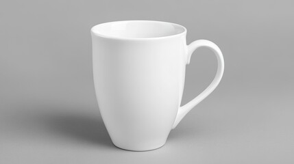 Fototapeta premium White ceramic mug on isolated light grey background. 