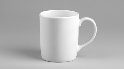 Fototapeta premium White ceramic mug on isolated light grey background. 