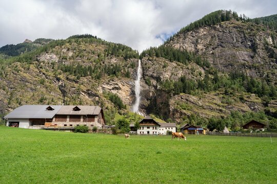 Scenic View of Fallbach Waterfall and Rural Landscape in Austria