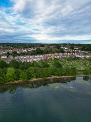 Fototapeta premium Aerial View of Southampton Port City of South England Coast, United Kingdom. High Angle Footage Was Captured with Drone's Camera From Medium High Altitude on May 16th, 2024 During Sunset.