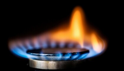 Gas burner flame igniting, symbolizing energy, combustion, and heating.