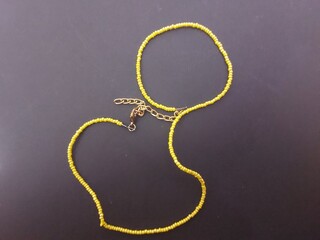 yellow bead necklace color isolated