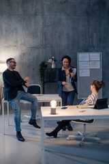 Business team enjoying a relaxed meeting in modern office