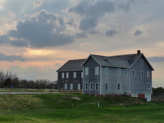 Obraz premium Cape Cod houses sunset
