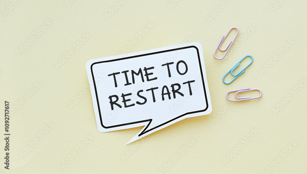 Poster sticky notes with time to restart message on yellow background