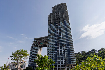 Thailand. Pattaya. October 29, 2024.53-storey condominium. It stands abandoned at the entrance to Bali Hai Pier