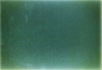 Blank grained film strip texture background with heavy grain, dust and light leak
