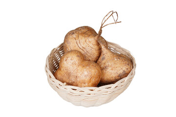 Some fresh jicama in the woven basket isolated transparent