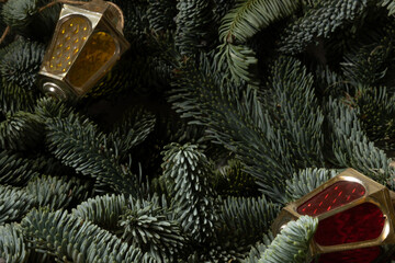 Beautiful festive decorations on the Christmas tree. Close-up. Beautiful Christmas background. The concept of decorations and decor for the new year. New Year's card 2025.