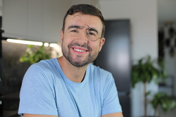 Funny man with crooked eyeglasses 