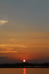 Obraz premium sunset over the river