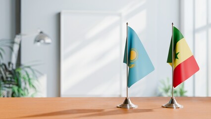 FLAGS OF KAZAKHASTAN AND SENEGAL ON TABLE