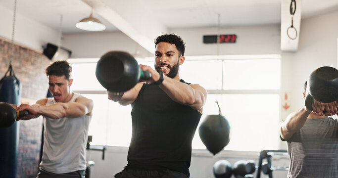 Fitness, kettle bell and men in gym with weights for bodybuilding training, exercise class and intense workout. Sports, serious and people with equipment for muscle strength, health and challenge