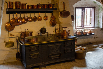 an old medieval kitchen in an exhibition at Egeskov Castle in Denmark