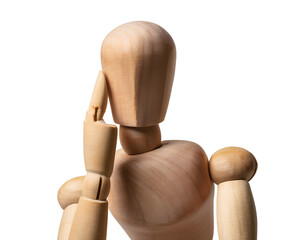 Close-up of a wooden mannequin with hand on head, symbolizing contemplation, reflection, or decision-making. The neutral expression and natural wood texture convey simplicity and artistic inspiration