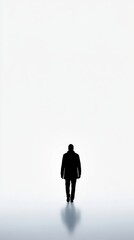 Obraz premium Silhouette of a man walking into the unknown, white isolated background.