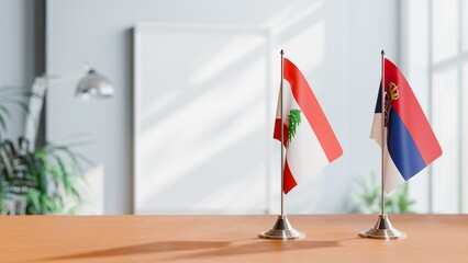 FLAGS OF LEBANON AND SERBIA ON TABLE