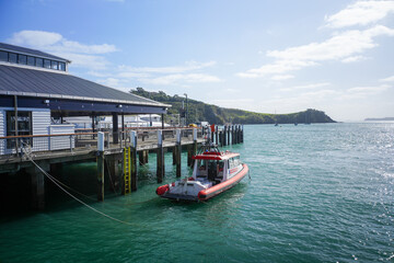 Scenic dock with boat in calm turquoise water