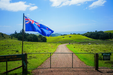 Scenic Rural Landscape with Flag and Pathway